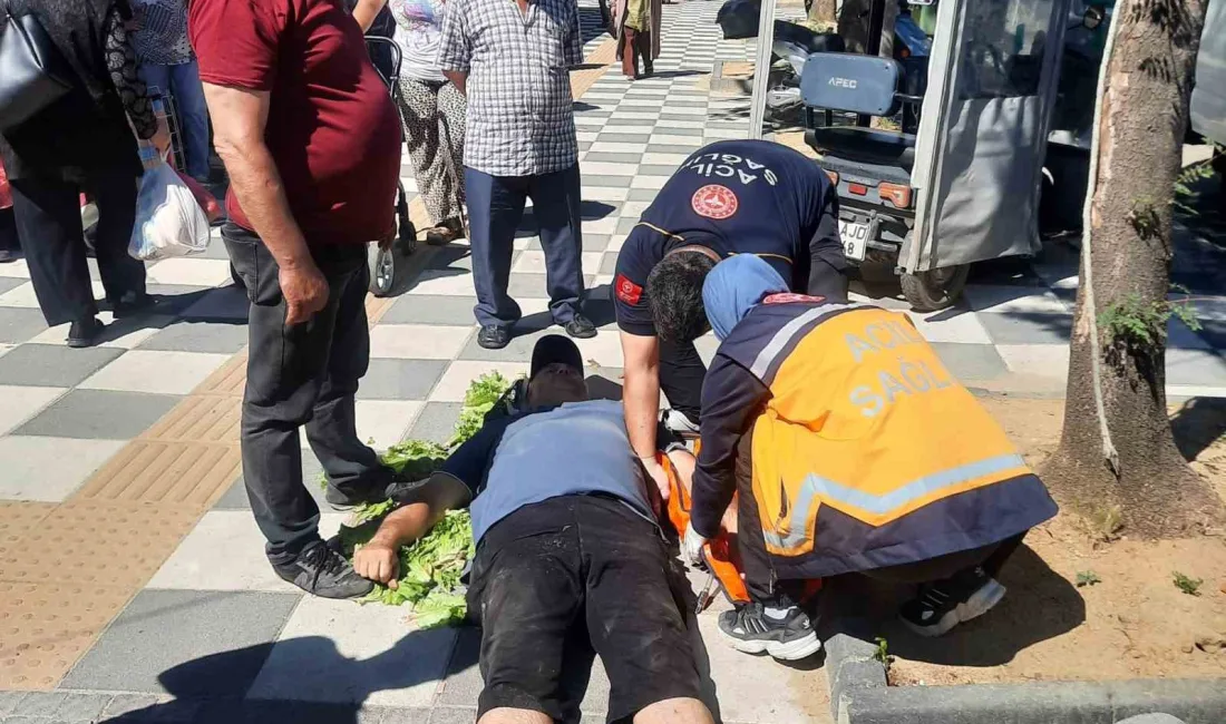 Tekirdağ’ın Muratlı ilçesinde semt pazarı girişinde bir vatandaş, kaldırımda ayağının